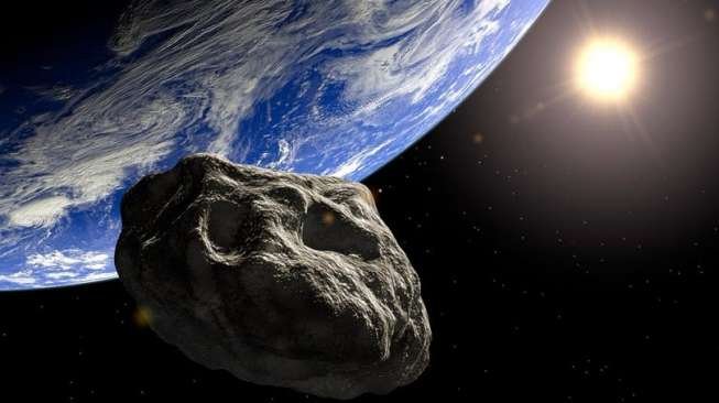 Ilustrasi asteroid mendekat ke bumi. [Mirror]