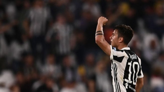 Penyerang Juventus, Paulo Dybala menyumbang satu gol di laga kontra Bologna (AFP/MARCO BERTORELLO)