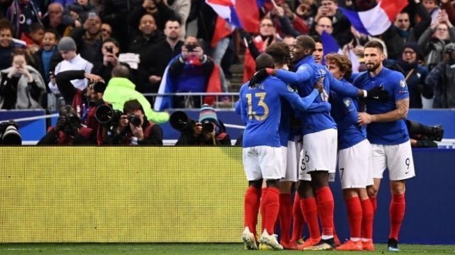 Para pemain Prancis merayakan kemenangan dalam laga Kualif⁮ikasi Piala Eropa 2020 di Stade de France stadium. FRANCK FIFE / AFP