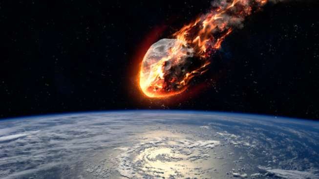 Ilustrasi meteor sedang memasuki atsmofer Bumi (Shutterstock).