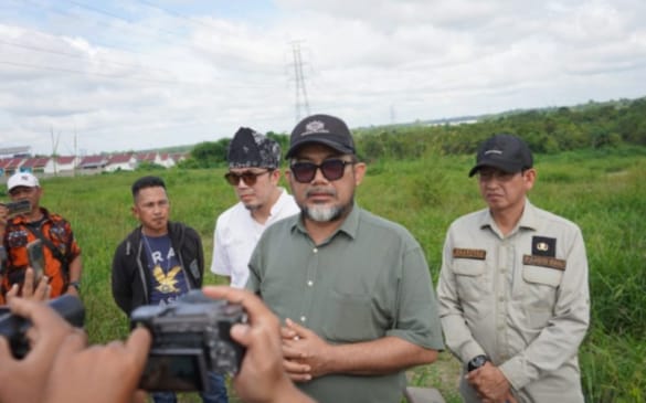 sekda provinsi jambi sudirman saat tinjau lokasi stockpile batubara.