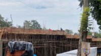 Tampak pembangunan ruko di simpang jalur dua DPRD Merangin sedang berlangsung. Rabu (13/3/2024).