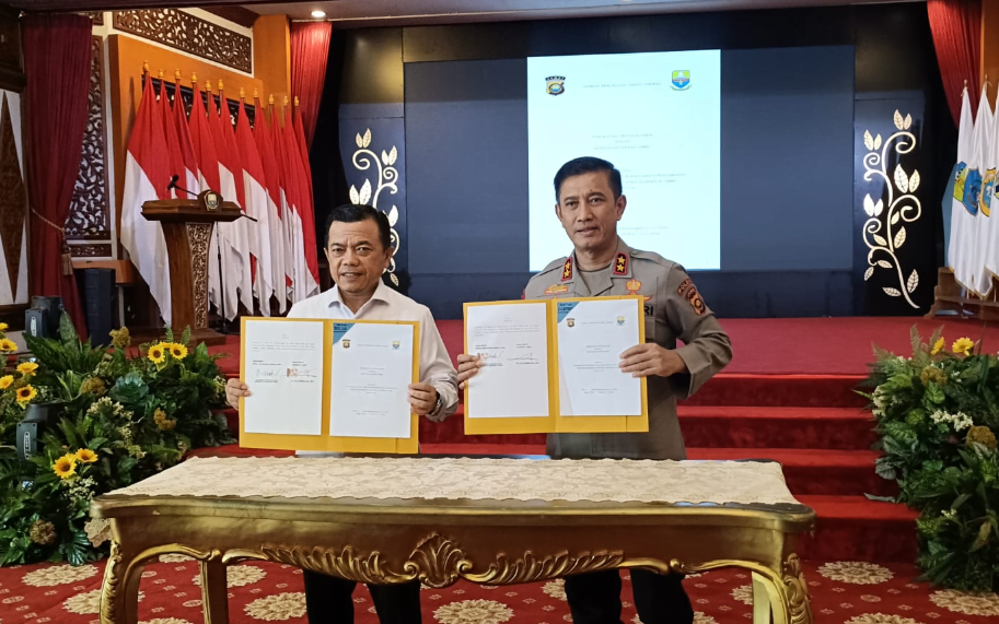 gubernur al haris dan kapolda jambi tandatangani nphd dana pengamanan pilkada 2024