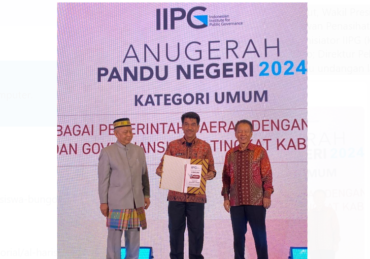 pj bupati muaro jambi raden najmi terima anugrah pandu negeri 2024