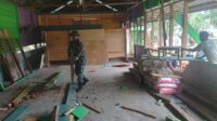 Satgas TMMD ke 122 Kodim 0420 Sarko Renovasi Madrasah Darul Ulum.