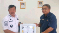 Bupati Kerinci Monadi Terima Penghargaan Pengelola Dana Desa
