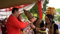Bupati Merangin H M Syukur dengan Hj Lavita Syukur.