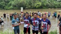 Gemuruh sorak sorai warga pecah di sepanjang tepian Sungai Batang Merangin, Minggu (29/3/2026). Ratusan masyarakat memadati lokasi untuk menyaksikan Lomba Biduk Tradisional yang digelar Persatuan Keluarga Besar Polri Desa Kungkai (PKBDK). Gemuruh sorak sorai warga pecah di sepanjang tepian Sungai Batang Merangin, Minggu (29/3/2026). Ratusan masyarakat memadati lokasi untuk menyaksikan Lomba Biduk Tradisional yang digelar Persatuan Keluarga Besar Polri Desa Kungkai (PKBDK).